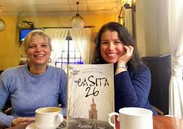 People struggle against the wind and rain in Malmö, Sweden, after a storm reached southern Sweden, Saturday Oct. 4, 2025. (Johan Nilsson/TT via AP)