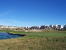 <strong>Golf course plus lake, phases 1 & 2 in background</strong> <br /><em> Corvera Golf And Country Club community, taken on 31 December 2009 by Anjinsan</em>