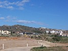 <strong>Driving range (long silver roof),Clubhouse (to left of driving range, redbrick on pillars under crane)</strong> <br /><em> Corvera Golf And Country Club community, taken on 01 January 2010 by Anjinsan</em>