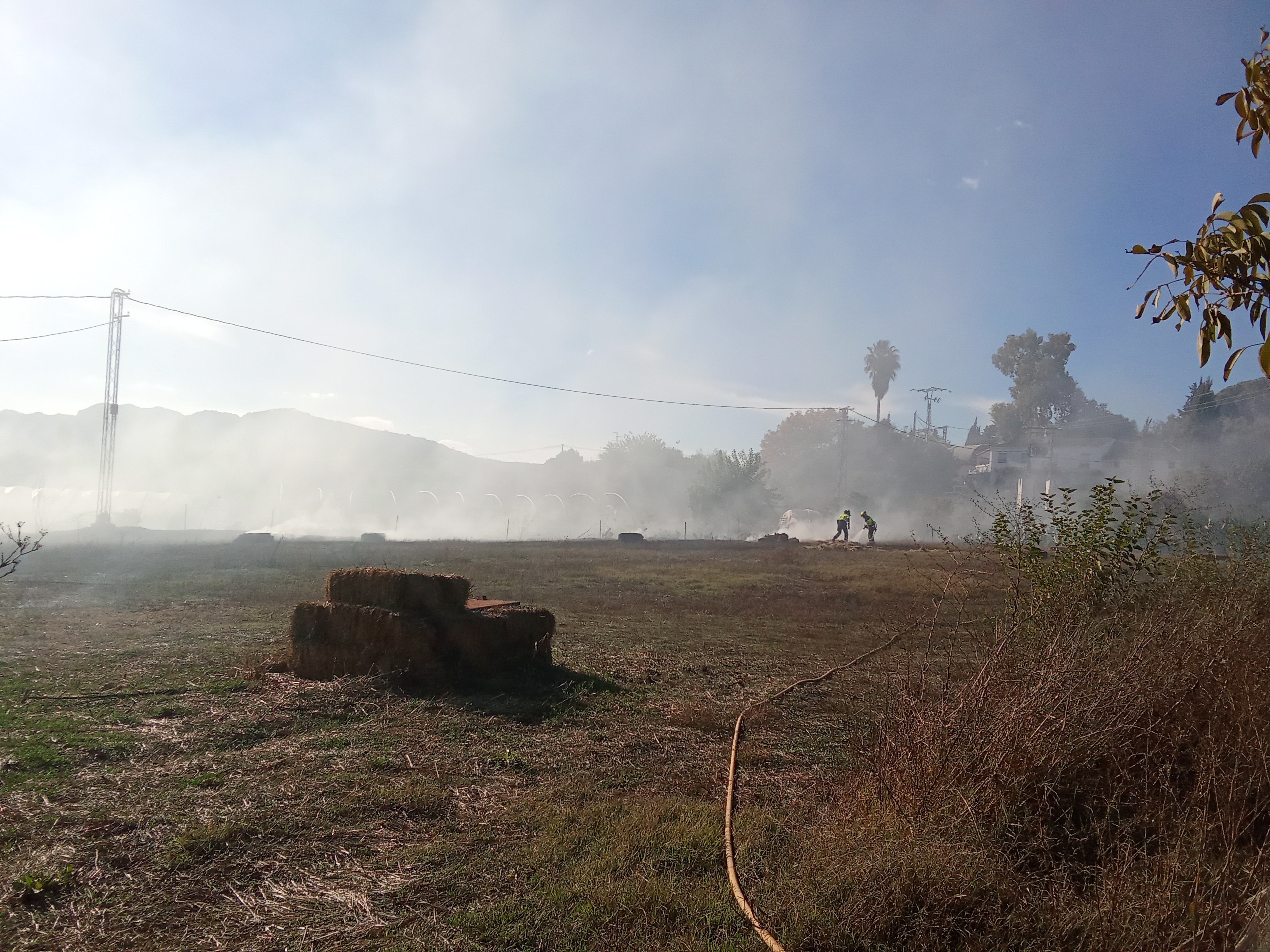 People struggle against the wind and rain in Malmö, Sweden, after a storm reached southern Sweden, Saturday Oct. 4, 2025. (Johan Nilsson/TT via AP)