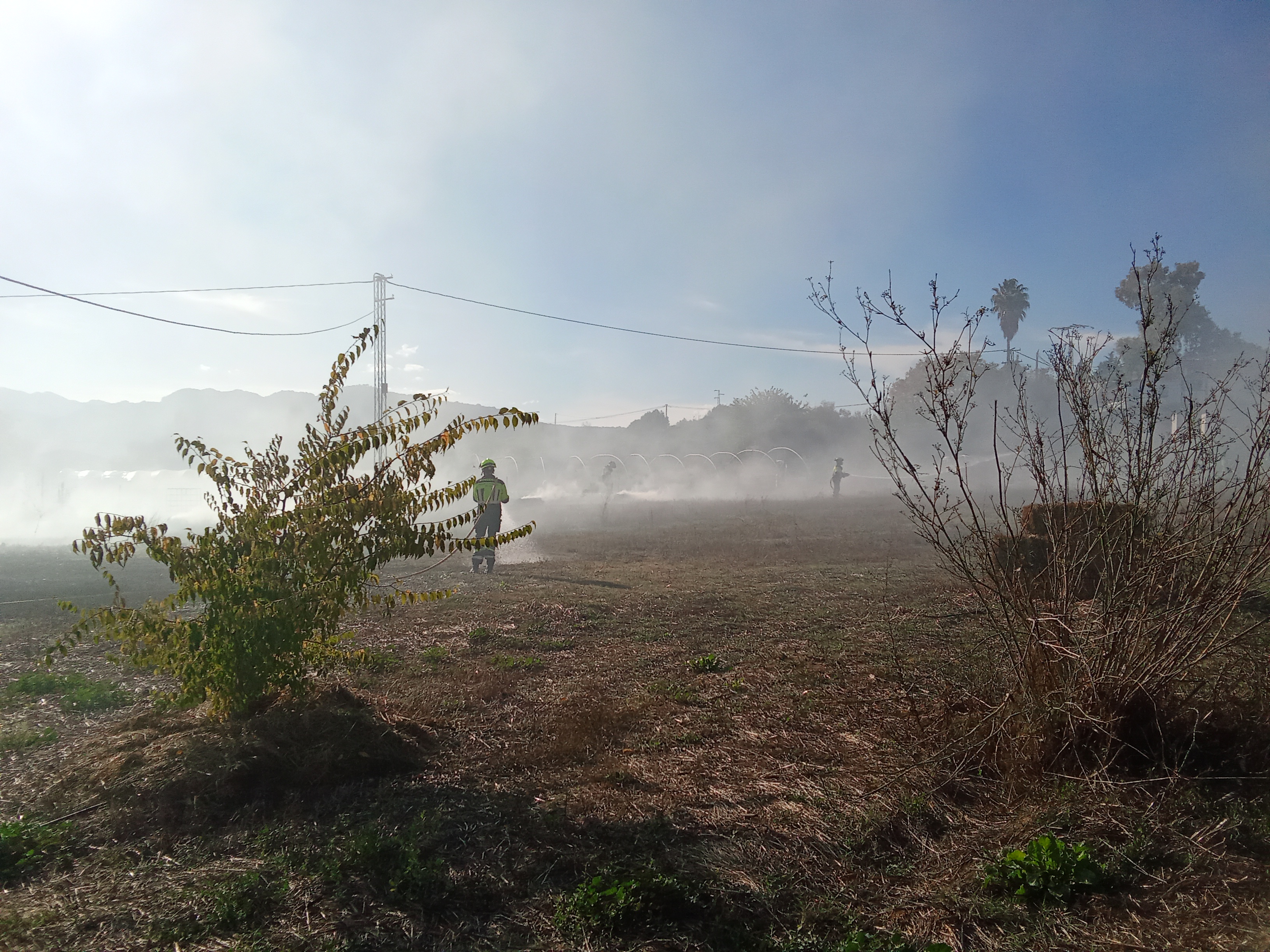 People struggle against the wind and rain in Malmö, Sweden, after a storm reached southern Sweden, Saturday Oct. 4, 2025. (Johan Nilsson/TT via AP)