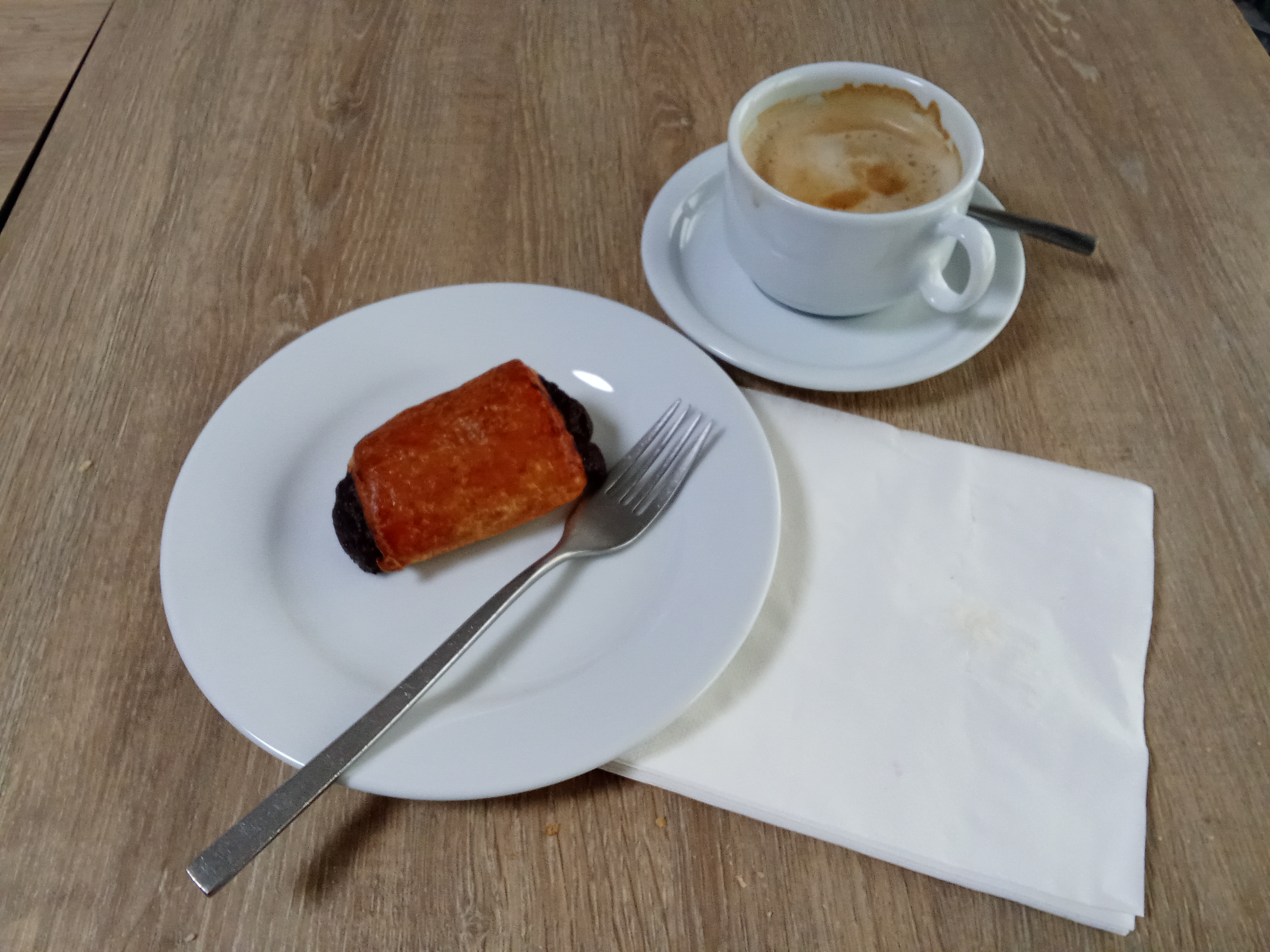 People struggle against the wind and rain in Malmö, Sweden, after a storm reached southern Sweden, Saturday Oct. 4, 2025. (Johan Nilsson/TT via AP)
