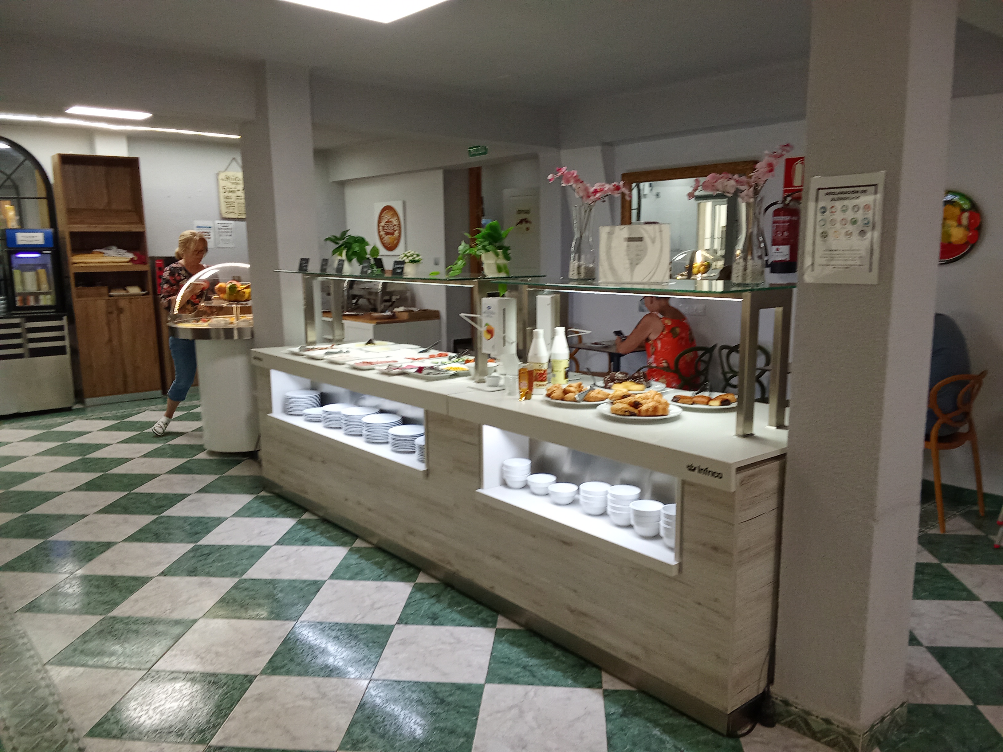 People struggle against the wind and rain in Malmö, Sweden, after a storm reached southern Sweden, Saturday Oct. 4, 2025. (Johan Nilsson/TT via AP)