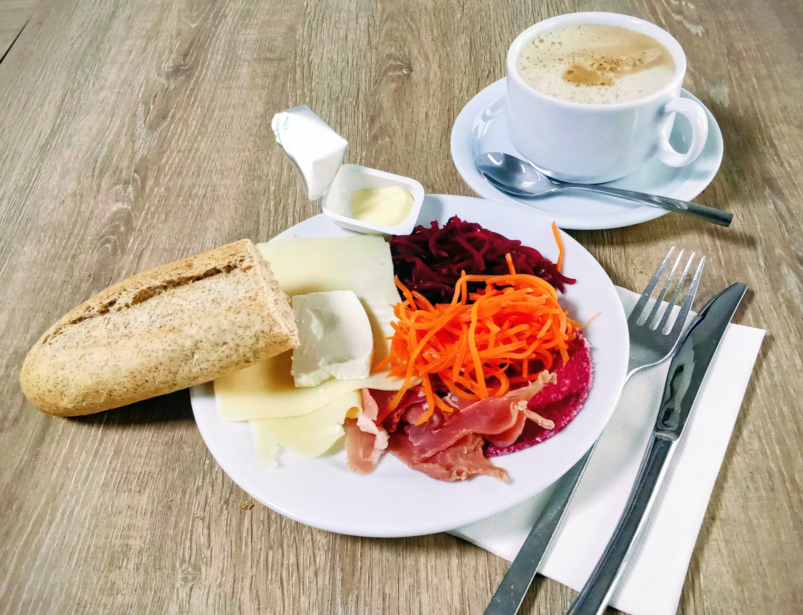 People struggle against the wind and rain in Malmö, Sweden, after a storm reached southern Sweden, Saturday Oct. 4, 2025. (Johan Nilsson/TT via AP)