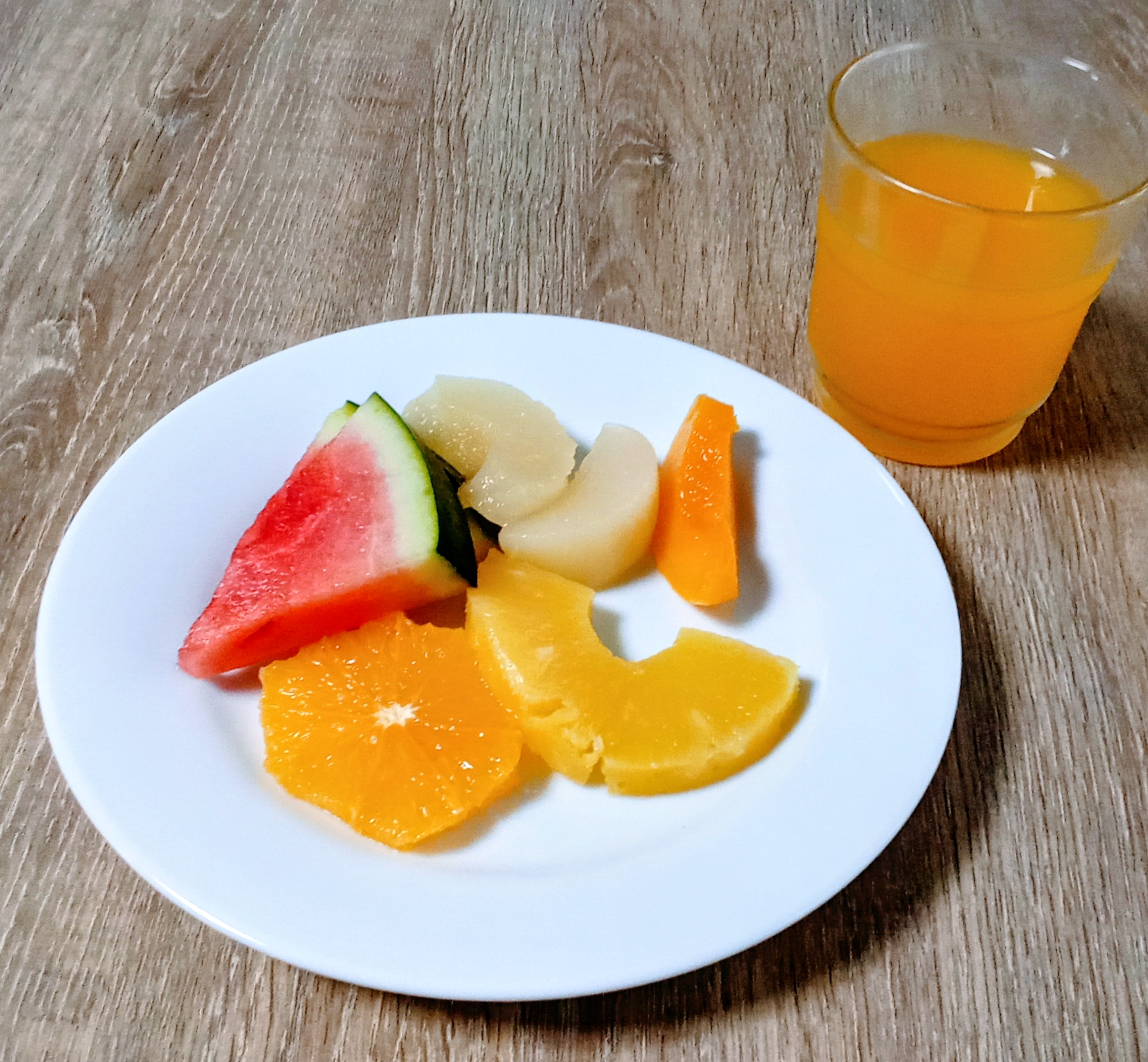 People struggle against the wind and rain in Malmö, Sweden, after a storm reached southern Sweden, Saturday Oct. 4, 2025. (Johan Nilsson/TT via AP)