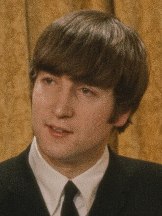 People struggle against the wind and rain in Malmö, Sweden, after a storm reached southern Sweden, Saturday Oct. 4, 2025. (Johan Nilsson/TT via AP)