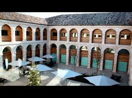 People struggle against the wind and rain in Malmö, Sweden, after a storm reached southern Sweden, Saturday Oct. 4, 2025. (Johan Nilsson/TT via AP)