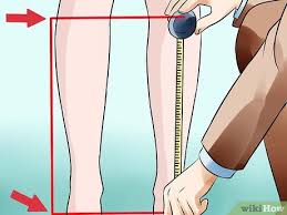 People struggle against the wind and rain in Malmö, Sweden, after a storm reached southern Sweden, Saturday Oct. 4, 2025. (Johan Nilsson/TT via AP)