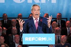 People struggle against the wind and rain in Malmö, Sweden, after a storm reached southern Sweden, Saturday Oct. 4, 2025. (Johan Nilsson/TT via AP)