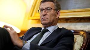 People struggle against the wind and rain in Malmö, Sweden, after a storm reached southern Sweden, Saturday Oct. 4, 2025. (Johan Nilsson/TT via AP)