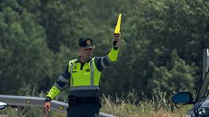 People struggle against the wind and rain in Malmö, Sweden, after a storm reached southern Sweden, Saturday Oct. 4, 2025. (Johan Nilsson/TT via AP)