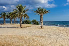 People struggle against the wind and rain in Malmö, Sweden, after a storm reached southern Sweden, Saturday Oct. 4, 2025. (Johan Nilsson/TT via AP)