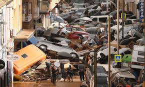 People struggle against the wind and rain in Malmö, Sweden, after a storm reached southern Sweden, Saturday Oct. 4, 2025. (Johan Nilsson/TT via AP)