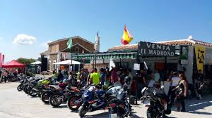People struggle against the wind and rain in Malmö, Sweden, after a storm reached southern Sweden, Saturday Oct. 4, 2025. (Johan Nilsson/TT via AP)